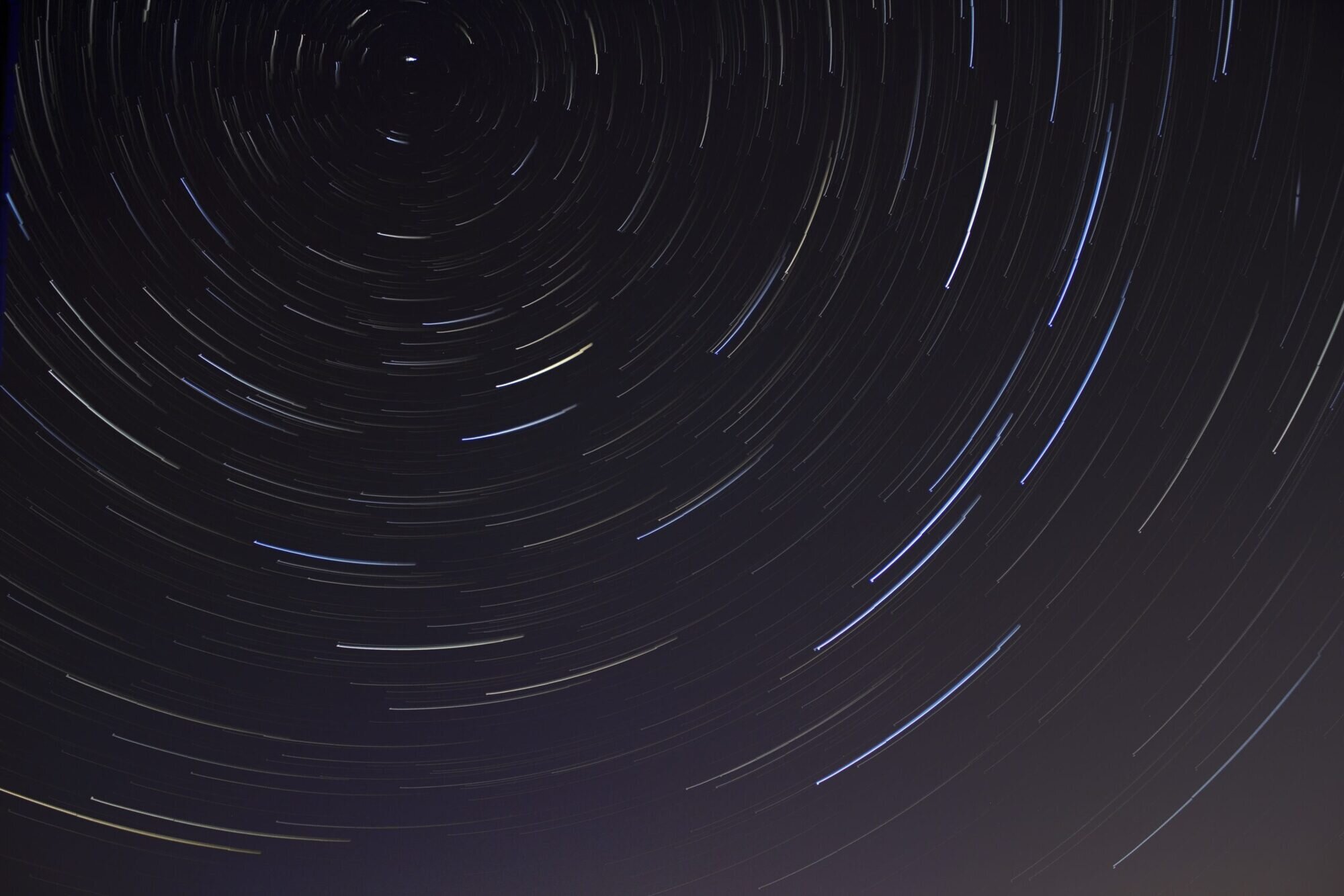 movement of stars in a night sky