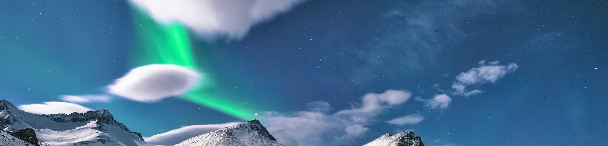 Mountain skyline with northern lights